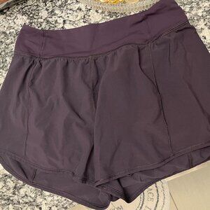 Lulu Lemon Yoga Shorts in Eggplant - size 8